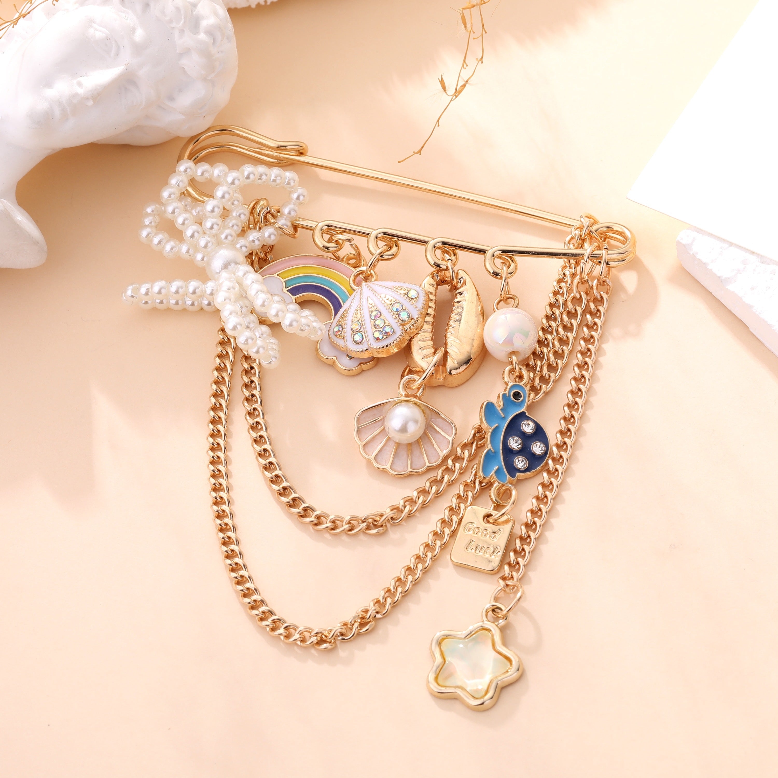 Broche NORA